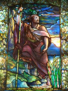 Detail of stained glass window created by Louis Comfort Tiffany in Arlington Street Church (Boston) depicting John the Baptist.