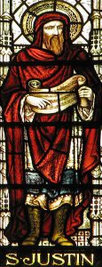 Stained glass depiction of Justin Martyr. Great St Mary's church in Cambridge.