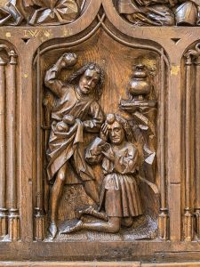 Cain and Abel at the choir stalls of Konstanz Minster, Konstanz, Baden-Württemberg, Germany. Heinrich Yselin and Simon Haider, 1470.
