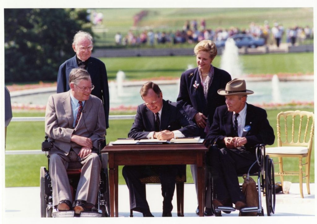 Image of President George H.W. Bush signing the Americans with Disabilities Act